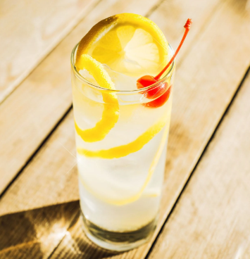 TOM COLLINS